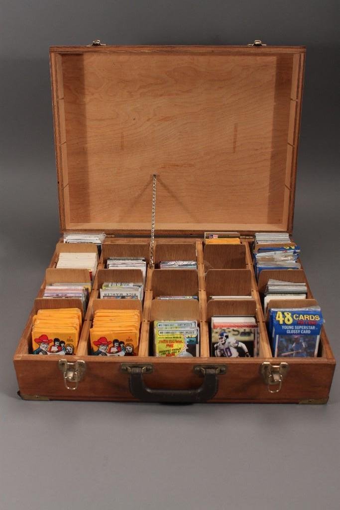 Sports and Non-sport Collector Cards: Includes: Dallas bubble gum cards, Rodeo Stars, baseball, and football. Some are new in original packaging. Cards come in wood carrying case