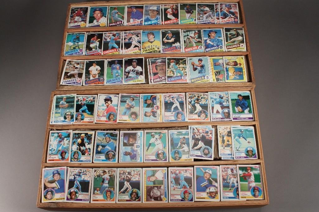 Topps Baseball Collector Cards: Large collection of 1983 and 1985 Topps cards come in a wood divided box
