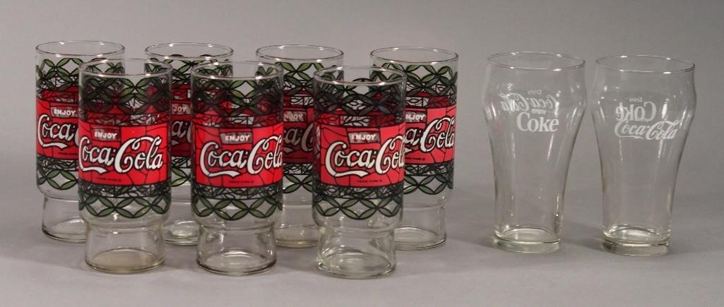 Vintage Coca-Cola Glasses (9): Includes (7) 6" painted coca-cola glasses (show some age and wear), and (2) clear glass coca-cola glasses 