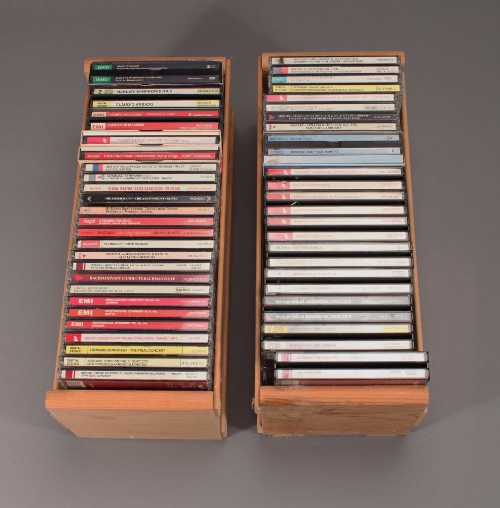 Classical CD Collection: large lot includes two wood carriers with cd titles that include Verdi Requim, Flamenco, Schumann, Shostakovich, and much more 