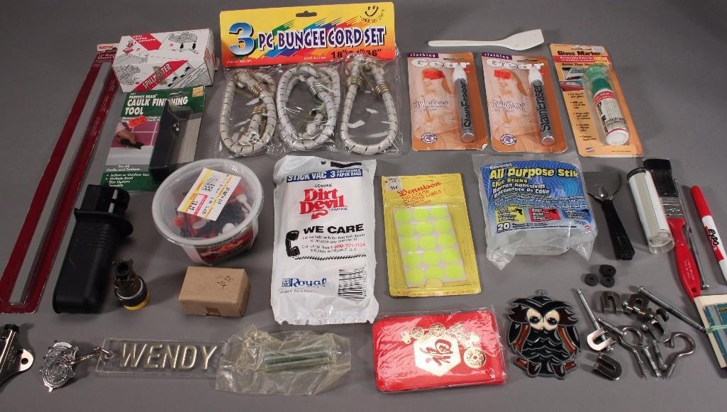 Tools and Office Supplies: Includes 3 piece bungee rope, 150 color coding labels, all purpose glue sticks, clothing stain erasers, glass marker, screw keys, 12'' rotary trimmer mat, and more.