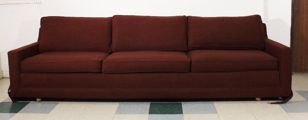 Brown Upholstered Couch: 109''x26''x36'', Good condition, shows some wear and age.