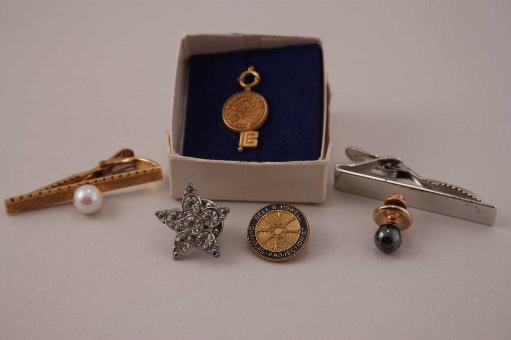 14K Gold and Pearl Tie Clip and Pins (6): Bell & Howell Qualified Projectionist gold tone pin, 14k gold tie clip with pearl, silver tone tie clip, and more.