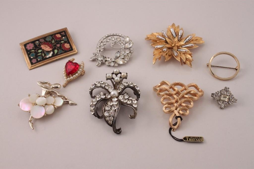 Vintage Ladies Brooches (9): Includes Trifari gold tone brooch, Lorenza gold tone brooch, ballerina with mother of pearl tutu, and more. 