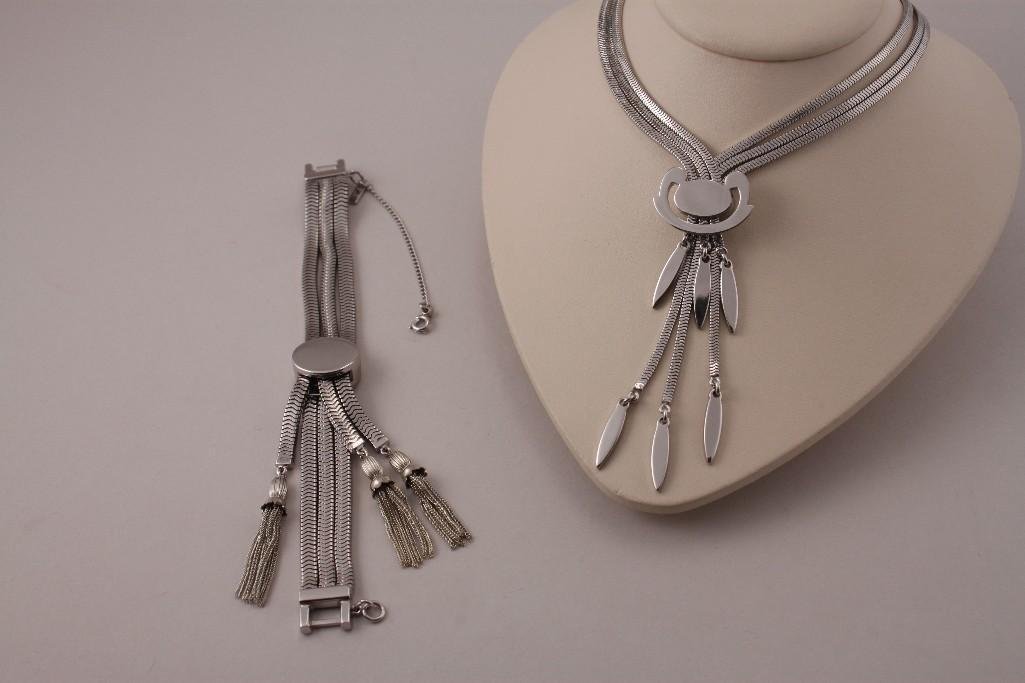 Monet Womens Bracelet and Necklace (2): Silver tone, necklace has 11'' drop, both marked Monet. Good condition.