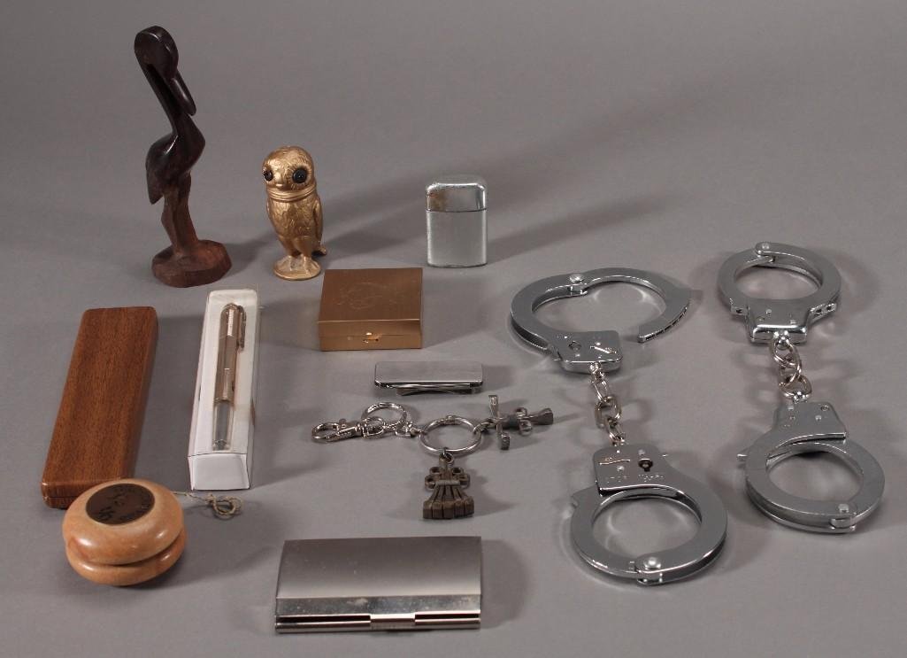 14K pens, Men's Accessories (12): Includes Arpege 14kt gold pens, wooden executive wooden yo yo Ronson lighter, two pair of hand cuffs, wooden bird figurine, and more.