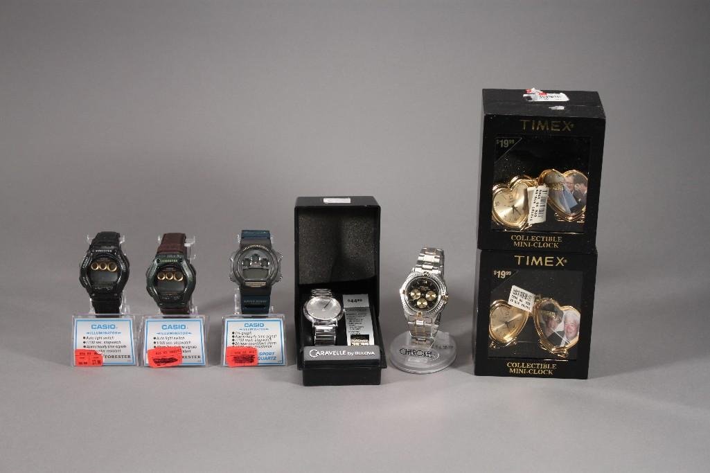 Men's Wrist Watches and Mini Clocks (7): (2) Time X collectable heart shaped mini clocks, Caravelle by Bulova Silver tone watch, (2) Forester watches with leather band, and more. 