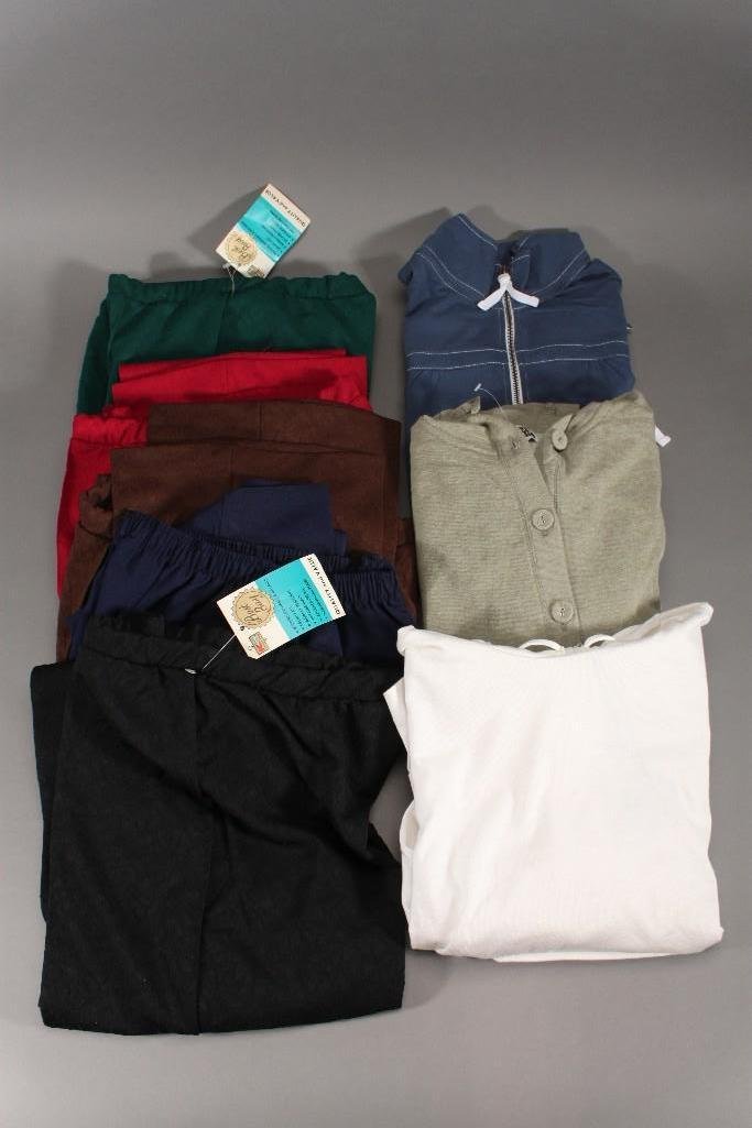 Women's Clothing (8): medium Route 66 green button-up sweater, blue Merona large zip up sweater, off white large hooded sweater, and five pair of pants size 16.