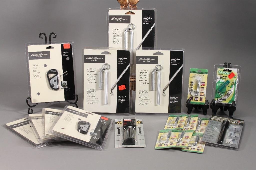 Keychain Lights and Eddie Bauer 7-Function Super: Includes eight LED keychain lights, five 7-function super carabiners, three camp/safety e-lights, Brinkman Black Max mini flashlight and more. All are in original packaging.