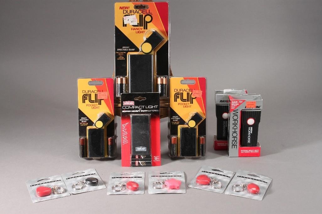 Flashlights (12): All are in original packaging, includes small keychain lights, work horse flashlights, Duracell flip pocket light and handy light 