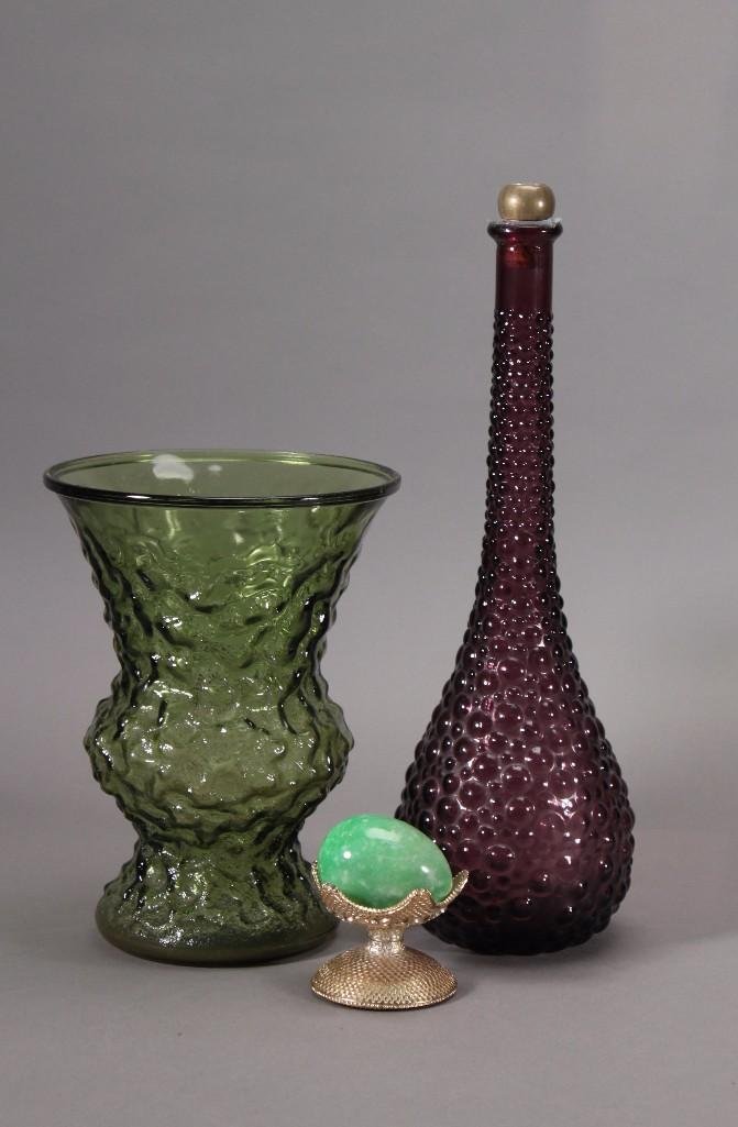 Home Decor (3)`: Includes gold tone stand with marble egg, 16'' purple bubble glass decanter, and clear green glass vase standing 10'' tall. 