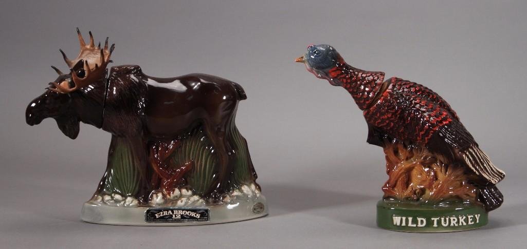 Vintage Liqueur Decanters (2): Includes Ezra Brooks moose 12 yeras old 90 proof bourbon bottle marked 1972 Ezra Brooks liquor bottle 185 and Wild Turkey Austin Nichols 8 years old bourbon bottle.