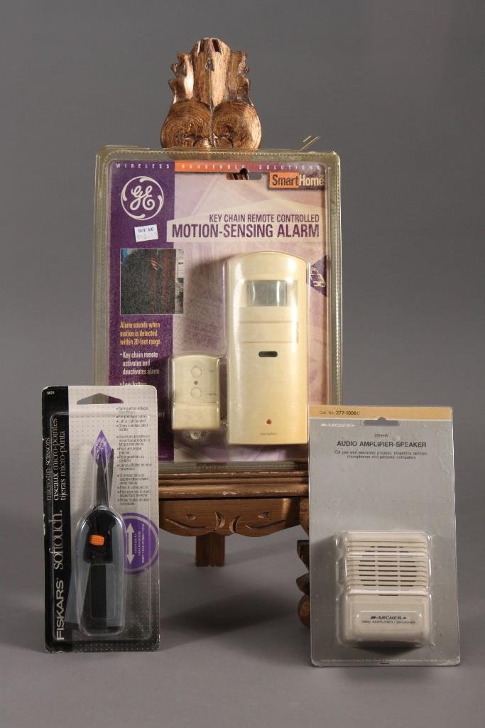 Amplifier Speaker and Motion Sensor (3): Archer audio amplifier-speaker, key chained remote controlled motion sensing alarm, and soft touch micro tip scissors. All are new in original packaging.