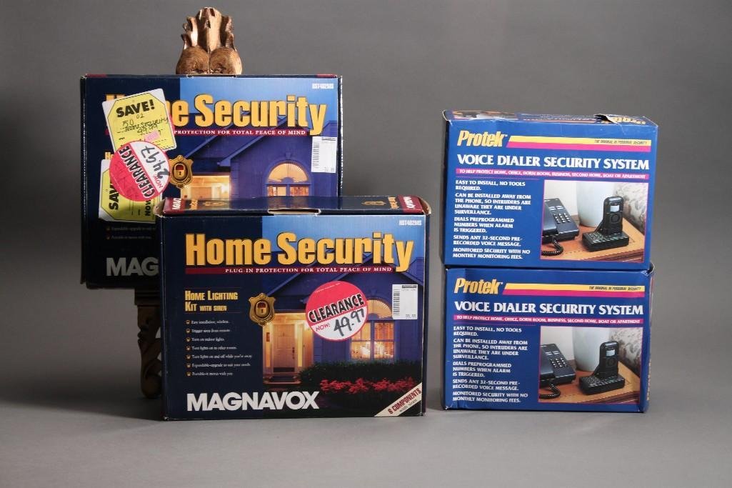Home and Voice Security Systems (4): two Protek voice dialer security systems and two Home security plug in home lighting kits. All are new in original packaging.