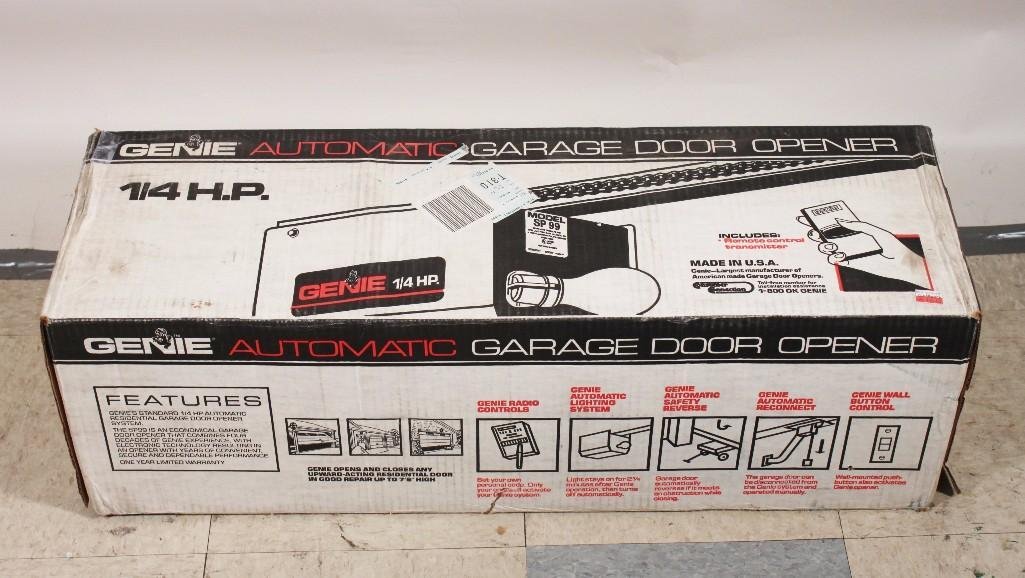 Genie Garage Door Opener: Automatic garage door opener with remote, model SP99. New in box, box shows wear, 1/4 HP.