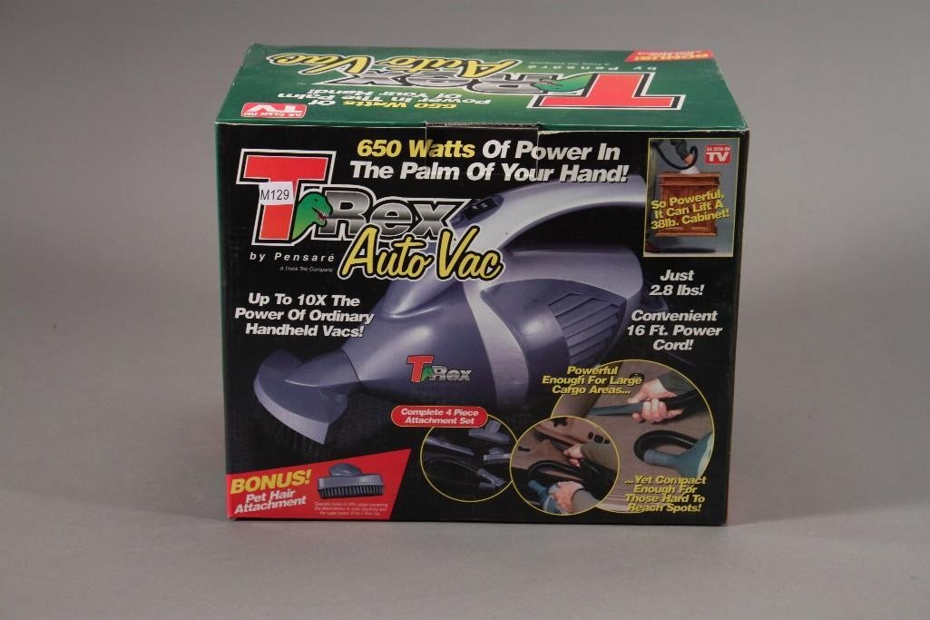 Handheld Auto Vac: T Rex 650 watt auto vac with bonus pet hair attachment. New in original packaging. 