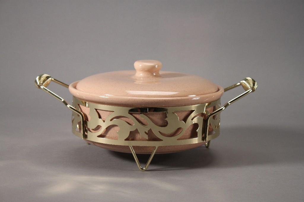 Bauer Casserole Dish and Lid with Gold Tone Holder: Marked Bauer, good condition, 4.5'' tall and a 8.5'' diameter on a gold tone holder.