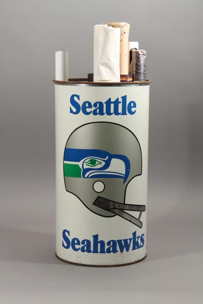 Seattle Seahawks Advertisement Can and Posters: Metal Seattle Seahawks advertisement can is marked p&k Products Company Inc. and measures 19.5" tall and has a diameter of 10.5". Posters include SF Giants, Coca-Cola, Nike, Chicago Bear