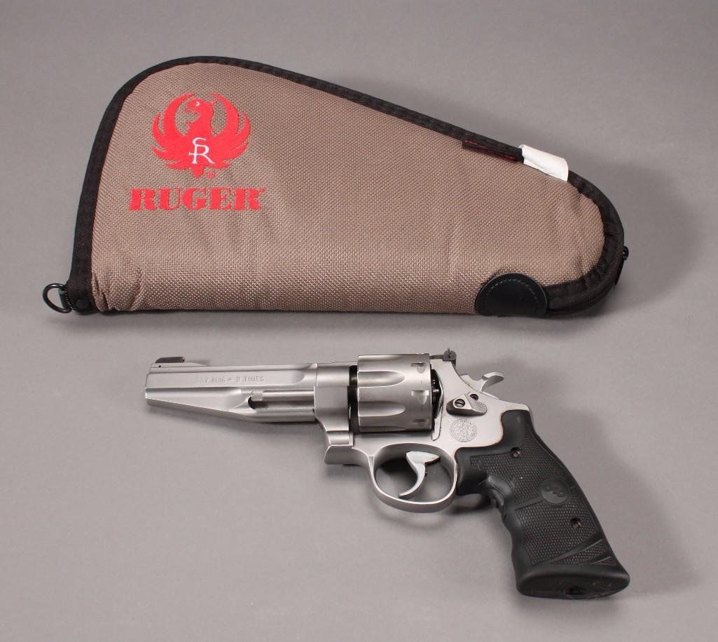 Smith & Wesson .357 Magnum - 8 Times (2): Smith &Wesson .357 Magnum with a padded canvas case by Ruger. Holds 8 rounds. Silver metal with black rubber handle, performance center. FFL Transfer Required - Check your local laws - We use M&am