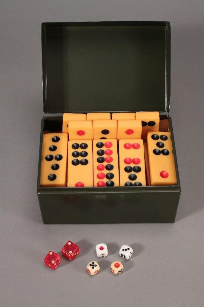 Bakelite Dominoes and Dice: Double six dominoes in metal box 2.75'' long, 32 dominoes, six dice two of which are Bakelite. Good condition.