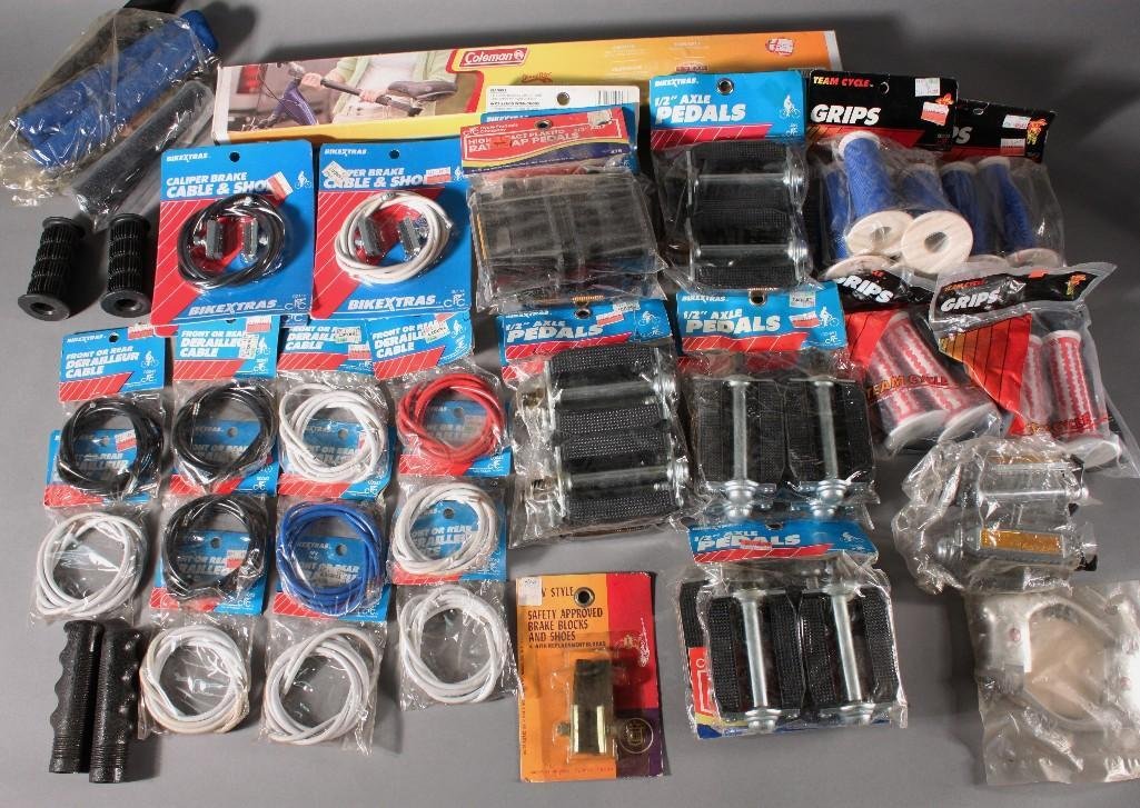 Bicycle Accessories: Large lot includes 1/2" axle pedals, Coleman alternative bike adapter, front or rear derailler cables, grips, and more. All are new in the package.