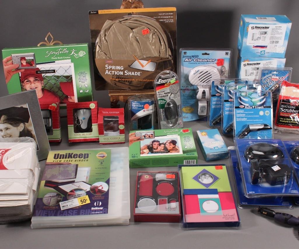 Auto and Office Supplies: Keychain laser pointer, photo pocket note cards, photo book creator, stationary set, spring action auto vehicle shade (jumbo size), Little Maid air cleaner, and much more.
