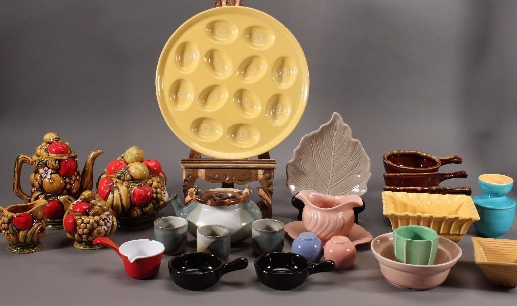 Ceramic Dishware: Ardco fine quality Dallas made in Japan cream and sugar, teapot and lidded jar, yellow pedistool pot marked Miramar of calif (good condition). 8/5, pink gravy boat marked (has some chips) ma