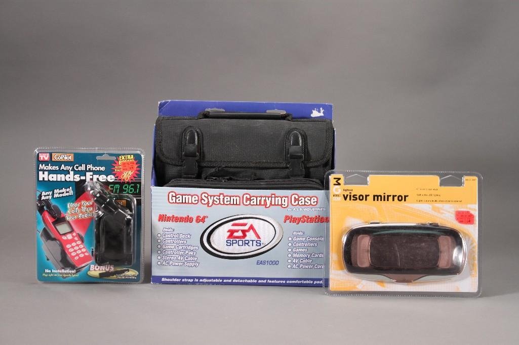 Visor Mirror and Carrying Case (3): Lighted visor mirror, EA Sports Playstation carrying case, and handsfree cell phone holder.