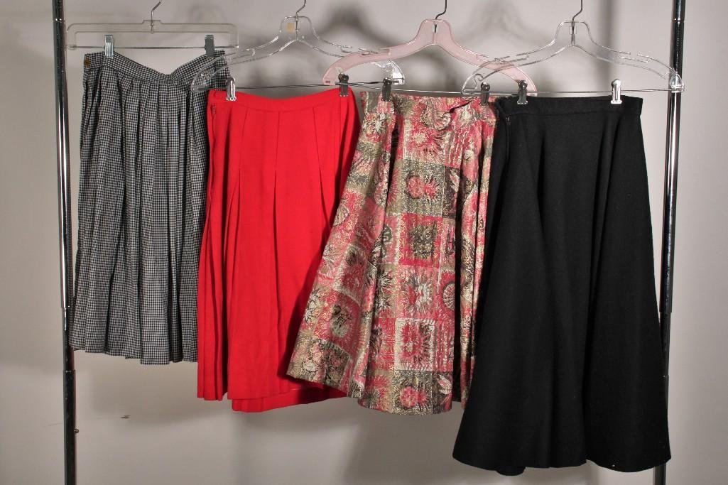 Vintage LLadies Skirts (4): Seashell and heart design skirt, no size or designer listed, good condition, black skirt in good condition, size and designer not listed, red skirt in good condition, size and designer not listed, and