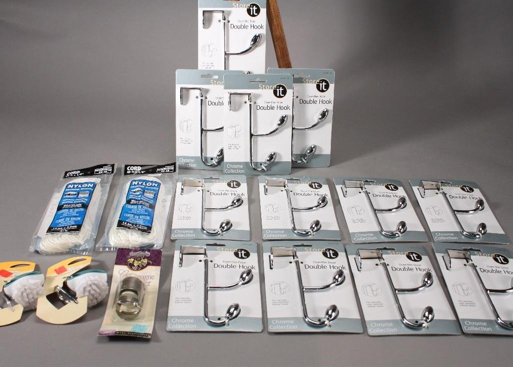 Over The Door Hooks and Nylon Cord: Store It over the door chrome double hooks, nylon cord, mushroom brushes, and a champagne stopper. All items are new in original packaging.