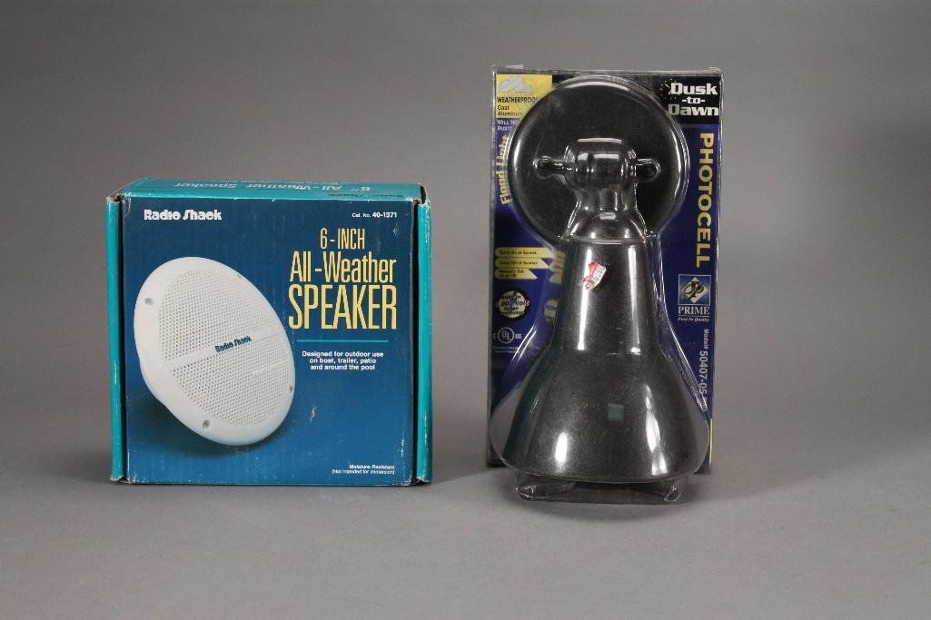 All Weather Speaker and a Photo Cell Light (2): Dusk-to-dawn photocell lantern model no 50407-05 black and a Radio Shack 6'' all weather speaker. Both items are new in original packaging.