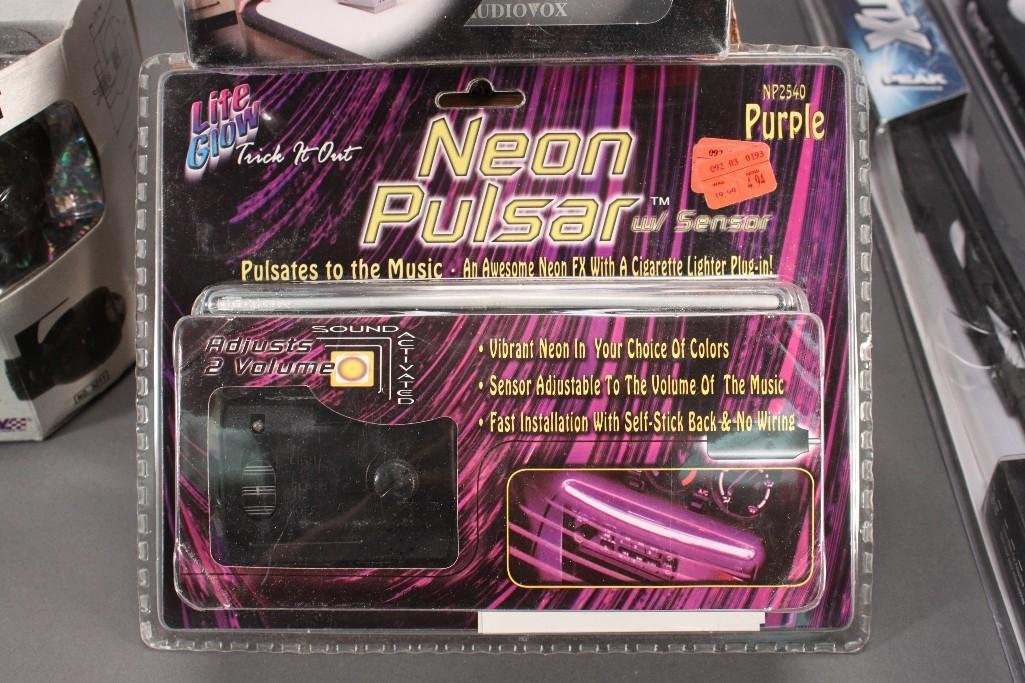 Car Accessories and Audiovox Base Station (5): Audiovox FRS base station, easy snap windshield wipers, racing series high performance lighting, and neon pulsar that pulses to your music. All items are new in original packaging.