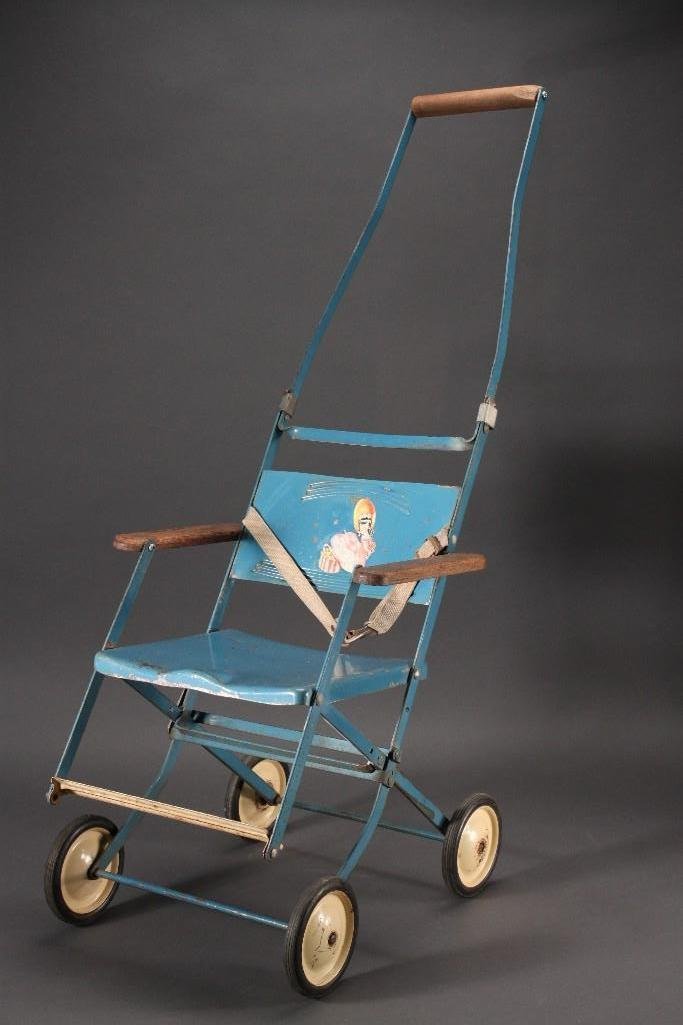 Vintage Metal Doll Stroller: 34 1/2" x 13 1/2'' folding metal stroller, in good condition for age.