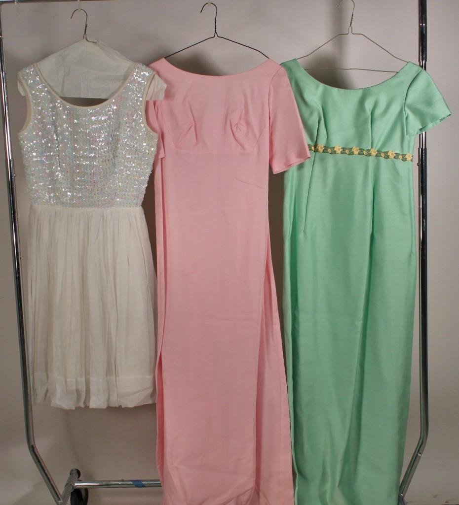 Ladies Vintage Dresses (3): Pink full length with flower train detail, no tags or size. White sequin and chiffon dress by Sherbet Originals, no size. Green full length with flower detail by Lorrie Deb SF, no size.