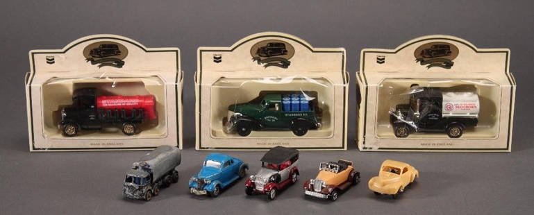 Die-Cast Metal Cars (8): Three in original packaging are Red Crown 1927 Gasoline Truck, 1939 Chevrolet Pick-Up, and 1920 Model T Ford. Other cars include Ertl&nbsp;Hot Rod, Zylmex Ford Roadster, Tomica Datsun, Lesney Truck, a