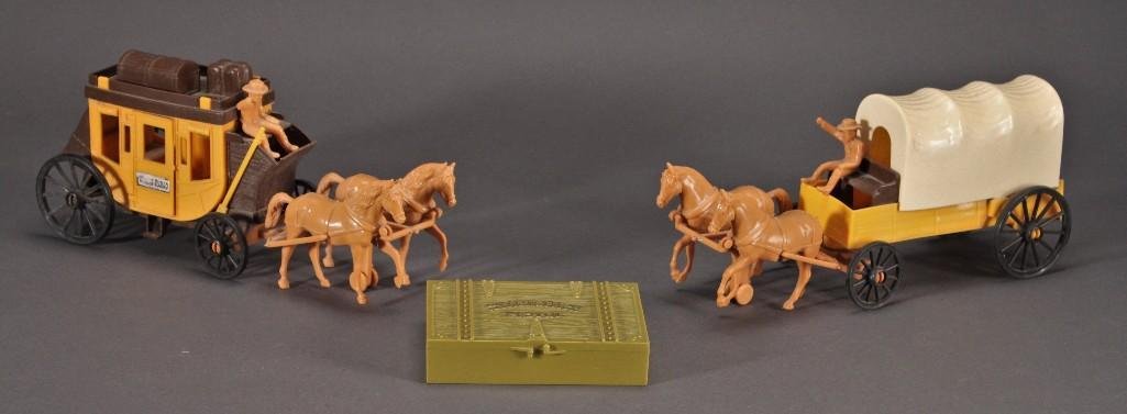Vintage Stagecoach Toys (3): Two Wells Fargo plastic toy stagecoaches with horses and one Stagecoach Pistol Box. White covered wagon, is not attached to the horses.