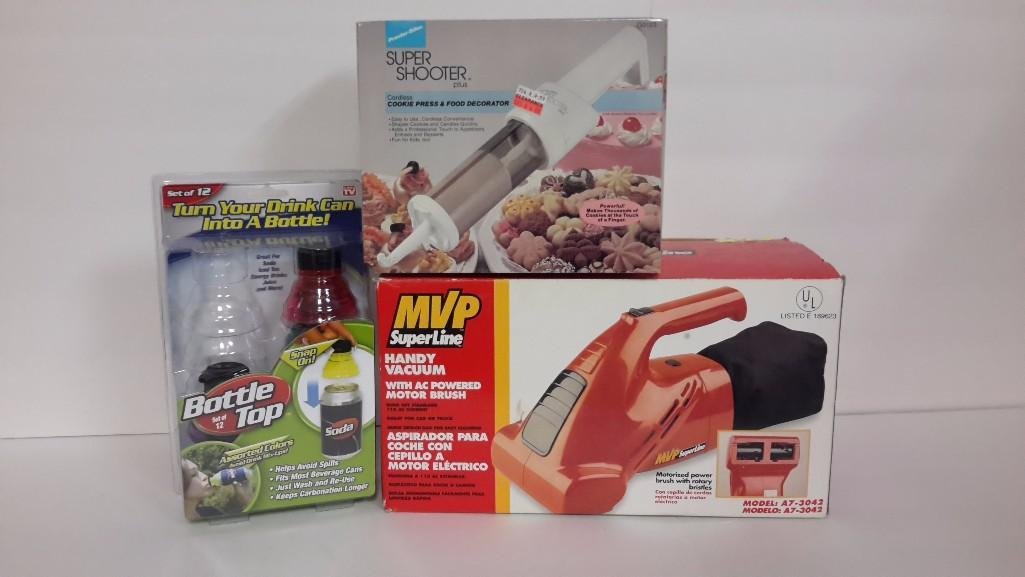 Home Goods (3): MVP Super Line handy vacuum, Super Shooter cookie press and food decorator, and bottle tops (3 missing).