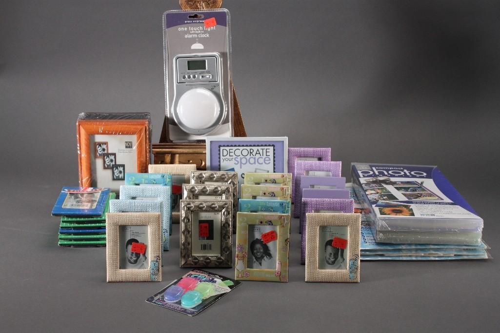 Picture Frames & Photo Organizer: Large selection of small picture frames, one touch light with alarm clock, compact photo organizer box and more.