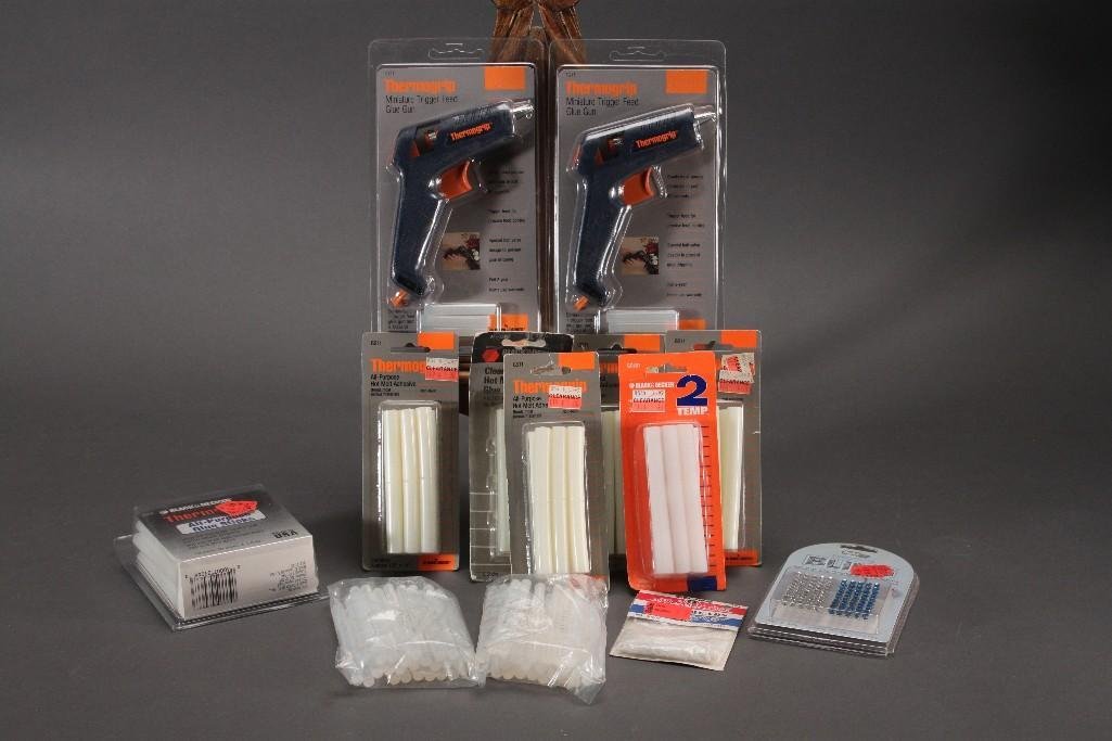 Hot Glue Gun and Glue Sticks: Two Thermogrip miniature trigger feed glue guns and 9 packs of glue sticks.