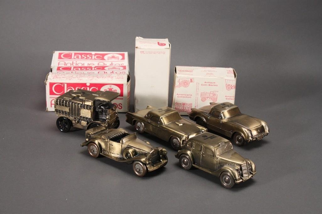 Antique Coin Banks (5): Five Huntington Banks coin banks, a 1955 FordThunderbird, 1906 Mack Truck, 1930 Cadillac coin bank, 1953 Corvette, and a Ford Taxi Cab. All banks include original box.
