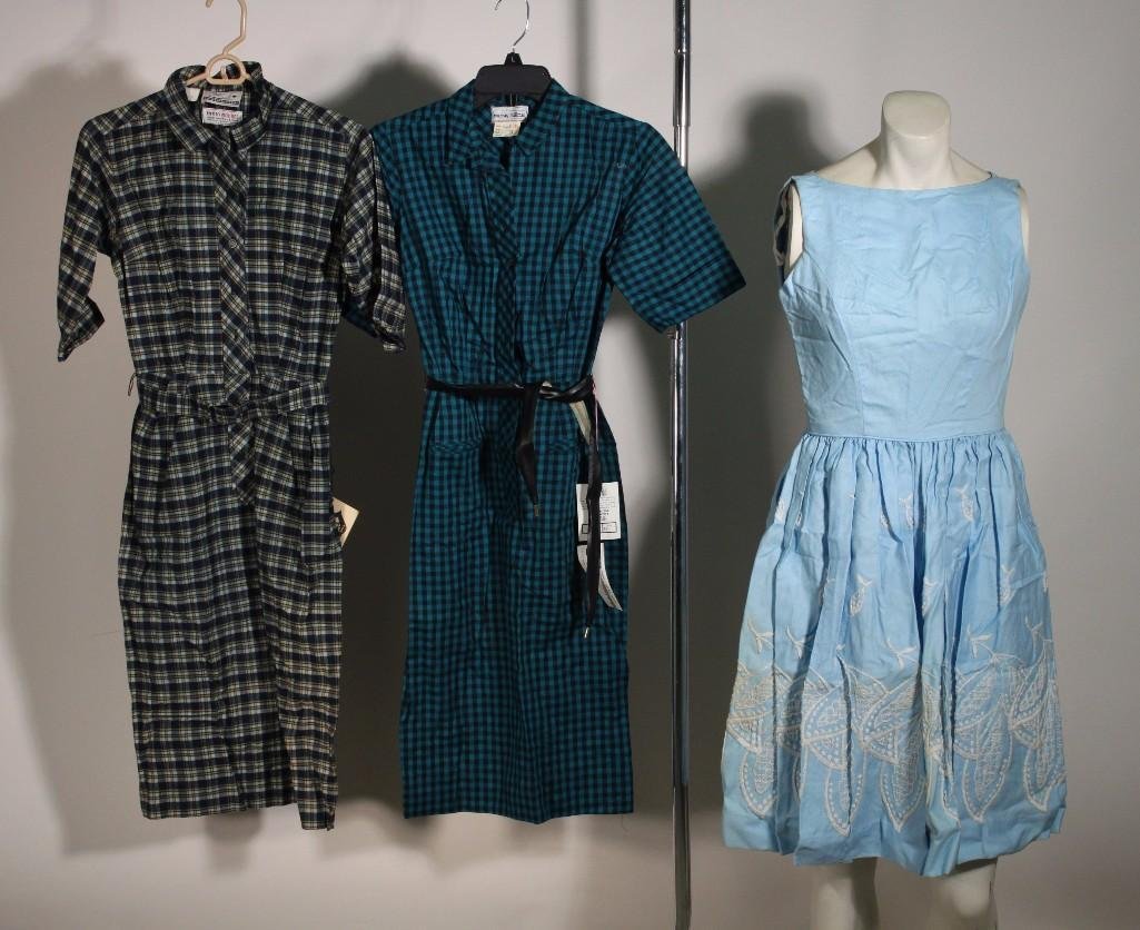 Ladies Vintage Dresses (3): Blue Gay Gibson dress size 7, plaid Serbindress size 8 NWT, and a checkered Murray Millmandress size 9 with belt NWT.