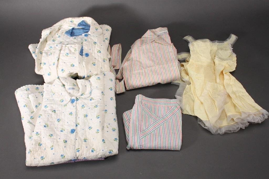 Children's Clothing and Robes: Yellow nylon slips size 6 NWT, 2 Little Miss quilted robes size 6, set of Juniors size 7 short outfits plus 2 extra shorts, size 9 sleeveless blouse.
