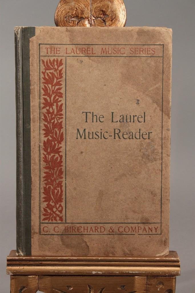 1906 Laurel Music-Reader Book: The Laurel Music-Reader Book, published by C.C. Birchard. In fair condition; Stains on front cover.
