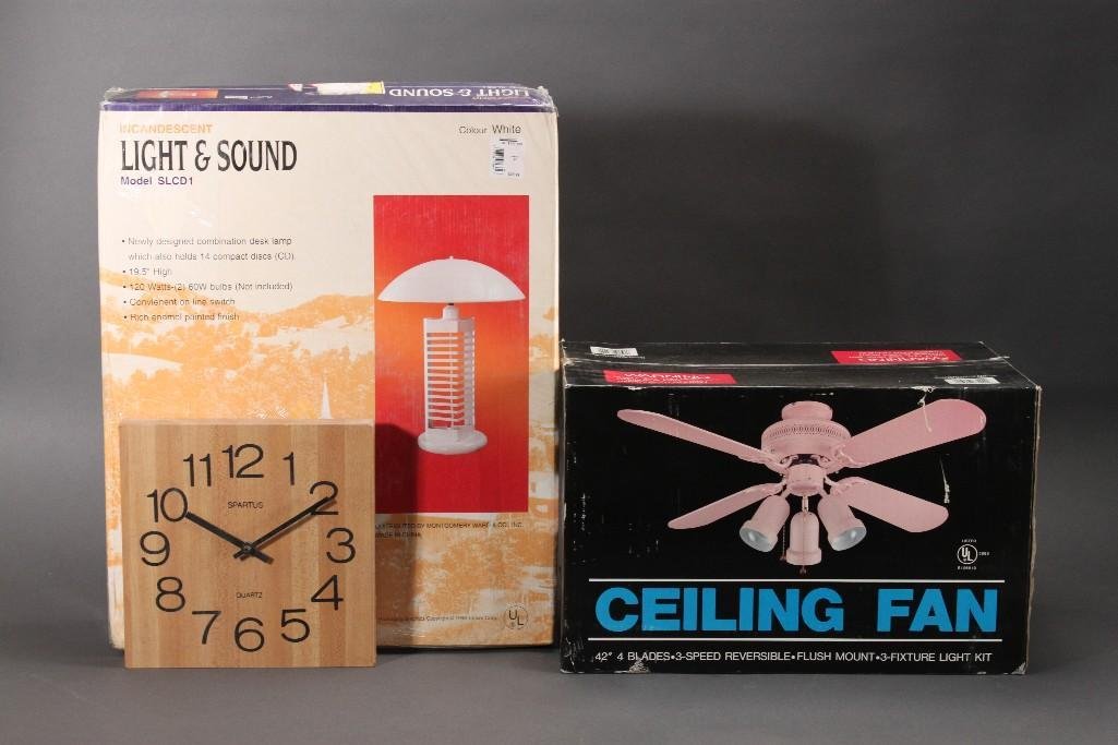 Home Goods (3): Tensor light and sound lamp new in box model no SLCD1, Quartz wood wall clock, and a 42'' 4 blade energy saver ceiling fan new in box.