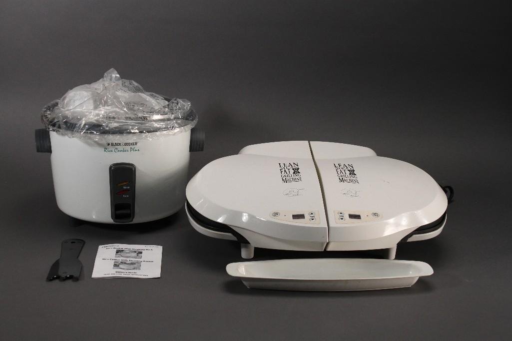 Rice Cooker and George Foreman Grilling Machine (2): Preowned Lean Mean fat reducing grilling machine, in good used condition and a new Black and Decker rice cooker plus.