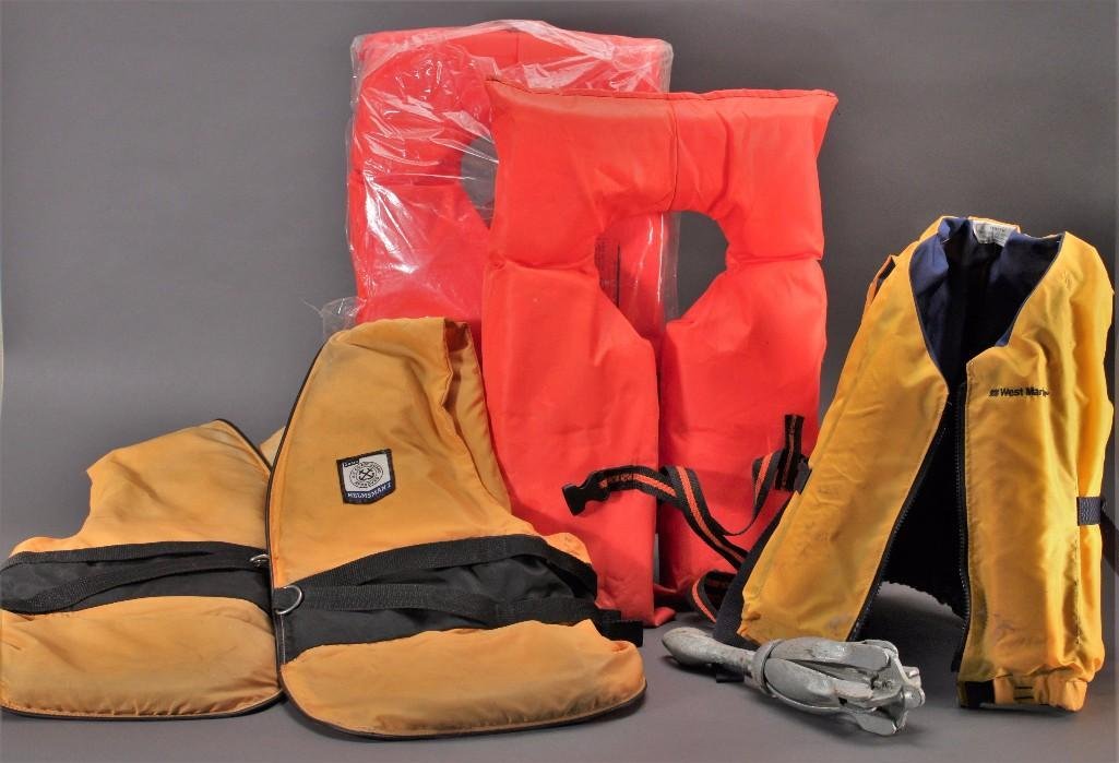 Life Vests and an Anchor (5): Anchor weighs 1.5kg, West Marine youth size vest 50-90lbs, Helmsman1 XL adult, two Near-Shore Buoyant Vests