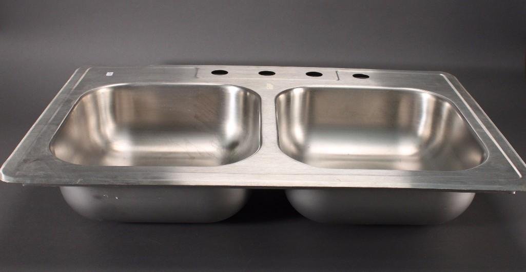 Kohnler Stainless Steel Double Bowl Sink: Model: K-3847-4-NA Toccata Size 33" x 22" x 9", in good condition, does not appear to be used.