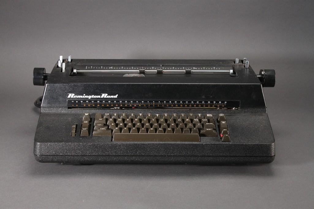 Vintage Remington Rand Typewriter: 115 volt, 1,2A, 60Hz, model 101, made in Holland. Includes cover and cord.