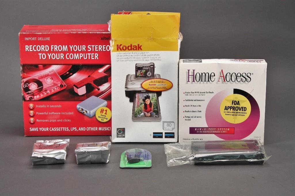 Office Supplies: Kodak color cartridge and photo paper kit (missing one color cartridge), stereo to pc recording kit, two Dell black ink series 5, and more.