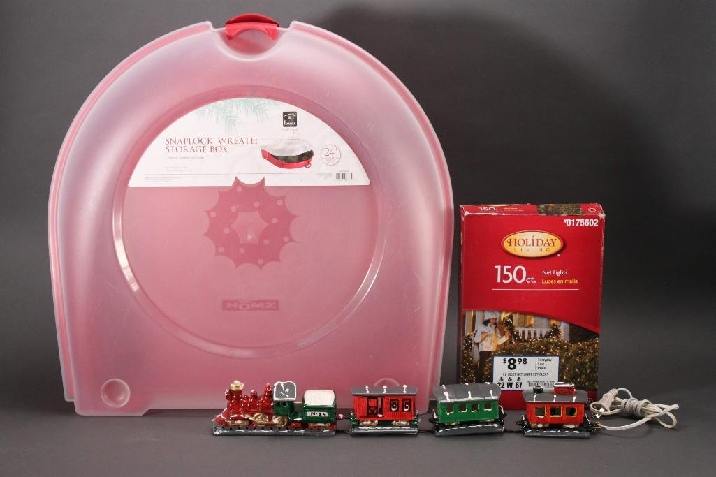 Christmas Decor: Holiday Living 150ct net lights, snap lock wreath storage box, Merry Christmas light up train set, and more.